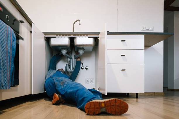 Professional Plumbing technician working in Central Point, OR